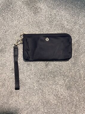 lululemon black zip pouch with gold-tone zipper